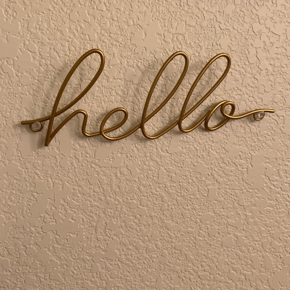 Gold "hello" wall decor from Urban Outfitters